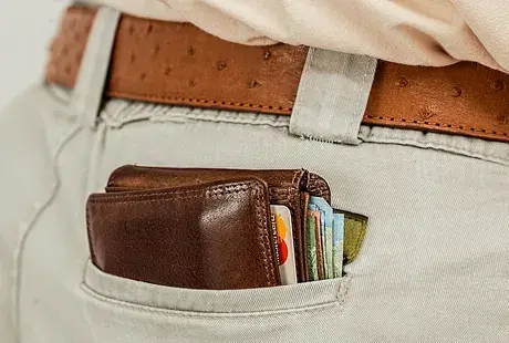 wallet full of credit cards in a pocket