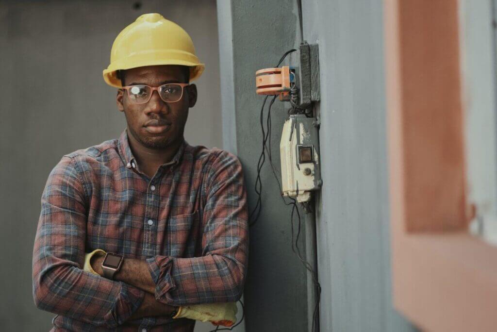construction worker with glasses posing for a photo